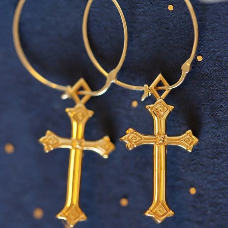 Серьги из золотой кросс -моды 18 тыс.
