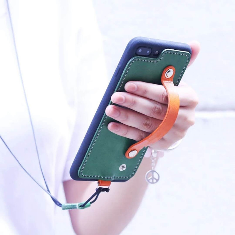 защитный чехол для мобильного телефона iphone 8. это сделано из телячьей шкуры. чемодан спроектирован с ручным поясом. Импорт tpu + pc два в один мягкий резиновый кожух