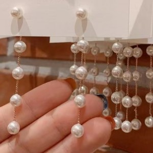 Серьга золотой жемчужины 18 тыс.